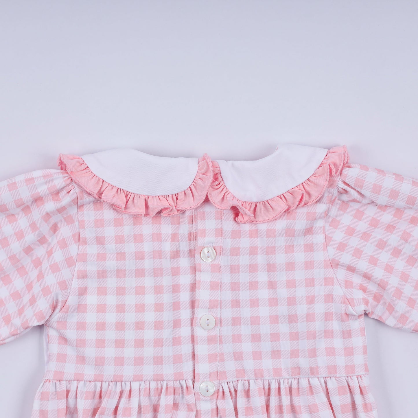 Pink gingerbread hand smocked gingham ruffle bubble