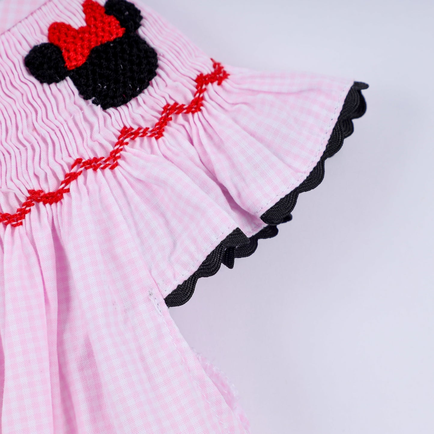 Red character hand smocked plaid ruffle bubble