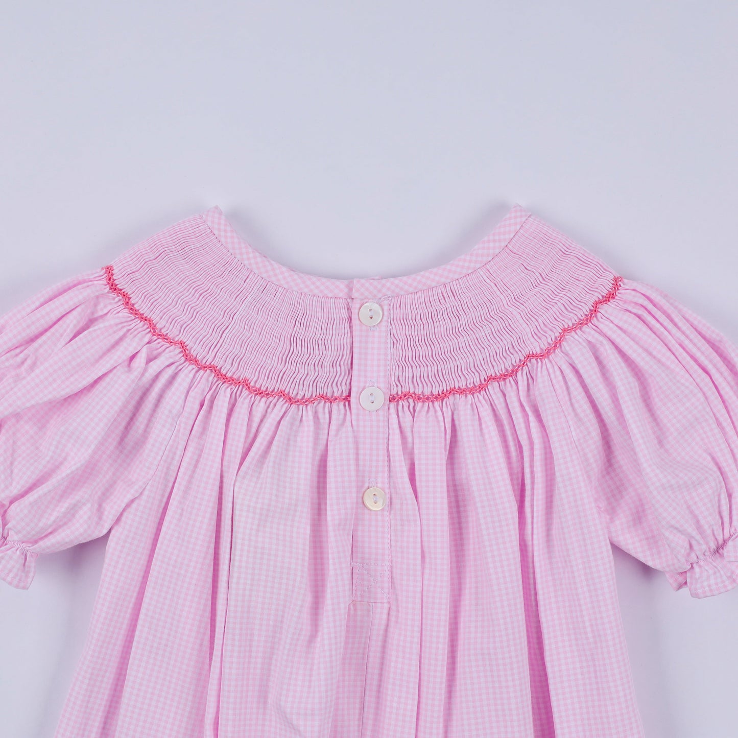 Pink christmas tree hand smocked ruffle romper